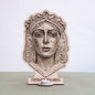 Rostro de la Esperanza Macarena en madera grabada con portavela de té para venta mayorista de artículos religiosos.