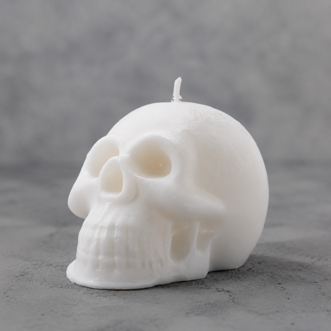 Velón Calavera Santa Muerte Blanca al por mayor ritualizado para salud, protección y limpieza espiritual.